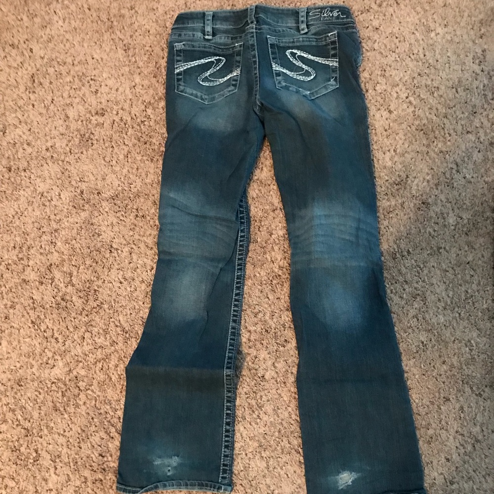Light wash silver jeans